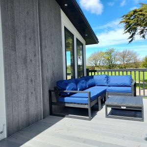 L-Shape Garden Sofa with Royal Blue waterproof cushions
